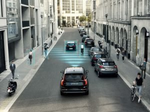 This undated photo rendering provided by Volvo Cars shows the car makers City Safety feature in one of their XC90 SUVs. City Safety features pedestrian and cyclist detection with full auto brake, day and night. (Volvo Cars via AP)