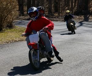 Dirt bike riders in Connecticut, such as these kids, are often forced to ride illegally on the street or trespass on private property because of the lack of land set aside in the state for ATV use. Bud Wilkinson / Republican-American