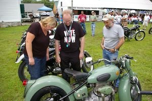 Brittany Mathes and T. J. Root of Harwinton admire Alistair Jones' 1954 Sunbeam S7 Deluxe at Brit Jam. Bud Wilkinson / Republican-American  	 
