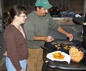 Cheryl and Brian Dunbar make sweet potato chips on their antique wood stove. Bud Wilkinson / Republican-American  