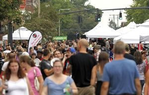 Throngs of people take to the street during Main Street Marketplace on Thursday night in downtown Torrington. Christopher Massa/RA