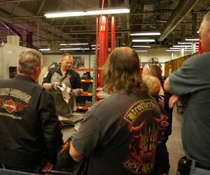 Jim Dugay explains how a seat pan is made during a tour of the Mustang Seats factory last Saturday for RIDE-CT readers. The charity event raised $605 for the Little Guild of St. Francis animal rescue shelter in West Cornwall. Bud Wilkinson / Republican-American 