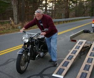 Gary Randall loads his 1968 BMW R50/2 on to a trailer after a breakdown in the Berkshires. Bud Wilkinson / Republican-American 