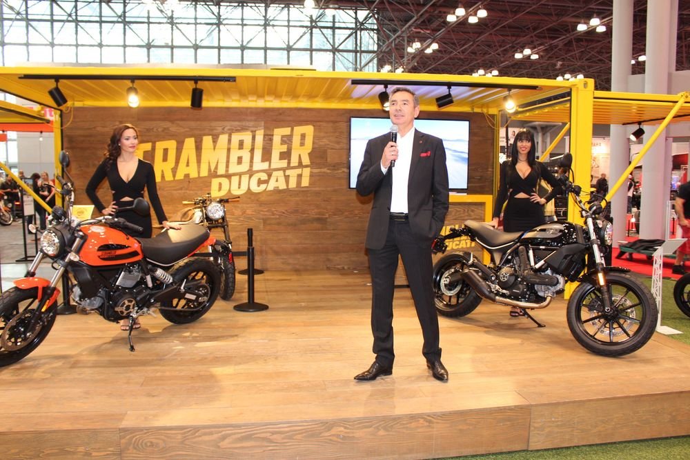 Dominique Cheraki, CEO of Ducati North America, shows off the new Scrambler Sixty2 model at the Progressive International Motorcycle Show in New York City. Bud Wilkinson / Republican-American  
