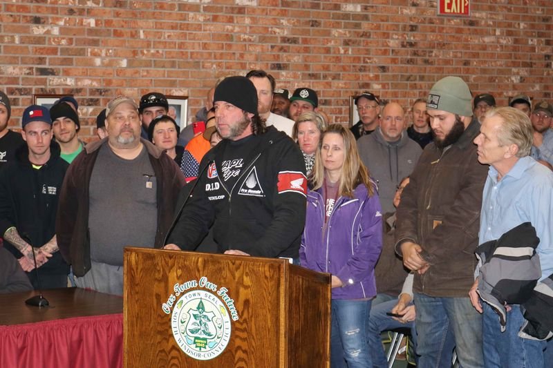 Bud Wilkinson Republican-American Ken Kaplan of the New England Motorcycle Museum addresses the town council in South Windsor on Monday night, backed by some of the hundreds of riders who showed up to protest a possible nuisance ordinance aimed at off-road riders of motorcycles and ATVs.